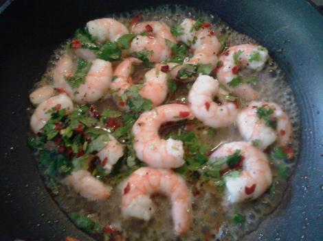 Fry the prawns for a couple of minutes just to warm them through really...
